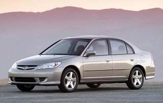 The last car she ever owned, a 2004 Honda Civic EX. She sideswiped a big rig in 2012, and walked away. Afterwards, we had the talk.